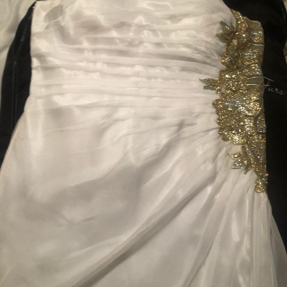 Strap less dress with open side.
